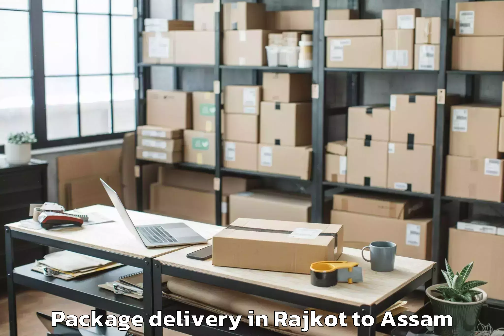 Discover Rajkot to Jonai Package Delivery